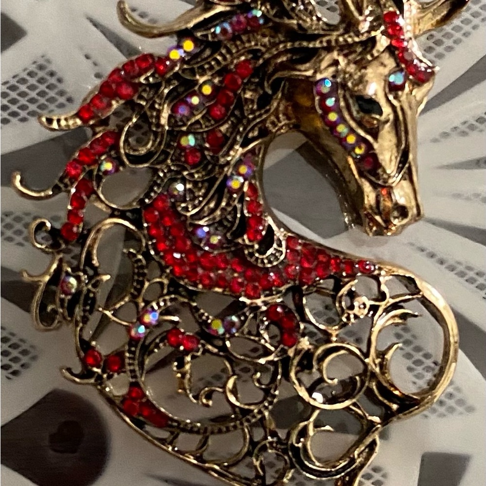 Gold-tone Horse Brooch with Red Crystal Accents Unisex.